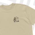 Load image into Gallery viewer, Beige t-shirt with 'Stumble Guys' graphic on a white background