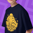 Load image into Gallery viewer, Person wearing a navy blue t-shirt with yellow Stumble Guys graphic design a pink background