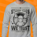 Load image into Gallery viewer, Gray sweatshirt with black Stumble Guys graphic design on a orange background