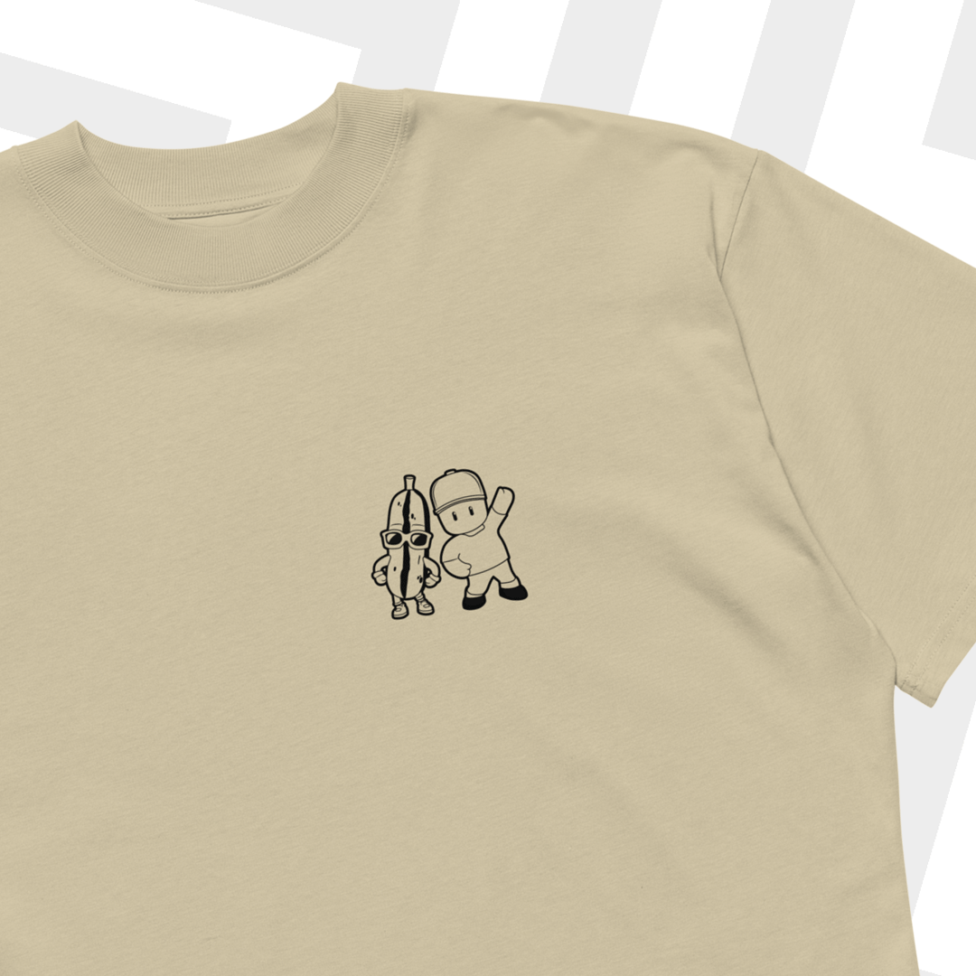 Beige t-shirt with 'Stumble Guys' graphic on a white background