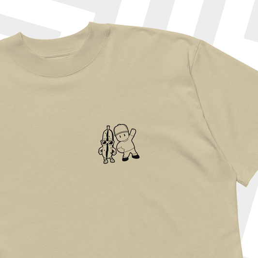 Beige t-shirt with 'Stumble Guys' graphic on a white background