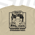 Load image into Gallery viewer, Beige t-shirt with 'Stumble Guys' graphic on a white background
