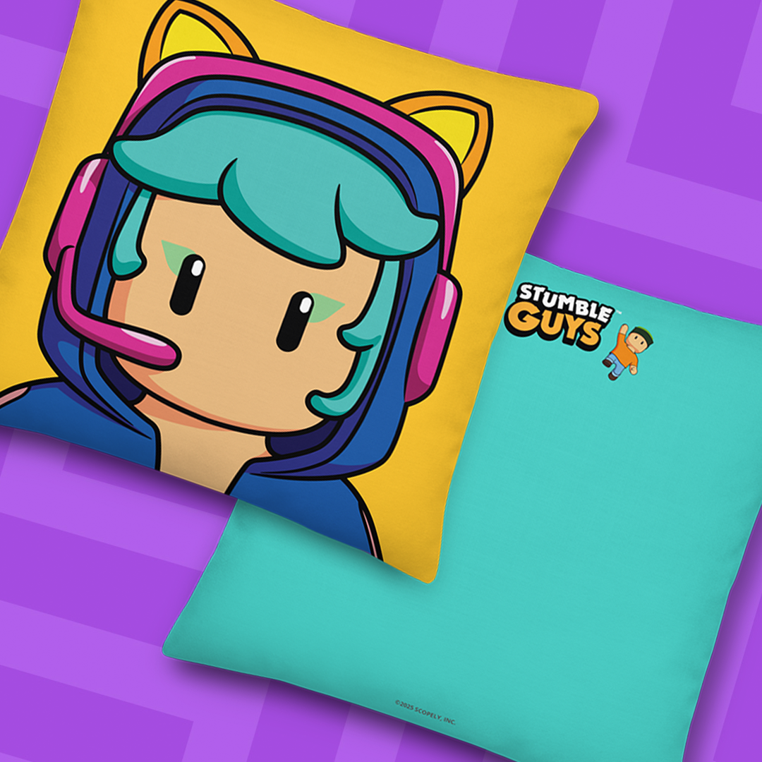 Gamer pillow on a yellow background, next to a teal pillow with 'Stumble Guys' logo.