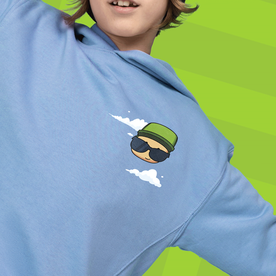 Child wearing blue Mr. Stumble hoodie on a green background