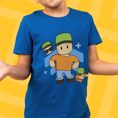Load image into Gallery viewer, Child wearing a blue Mr. Stumble t-shirt on a yellow background
