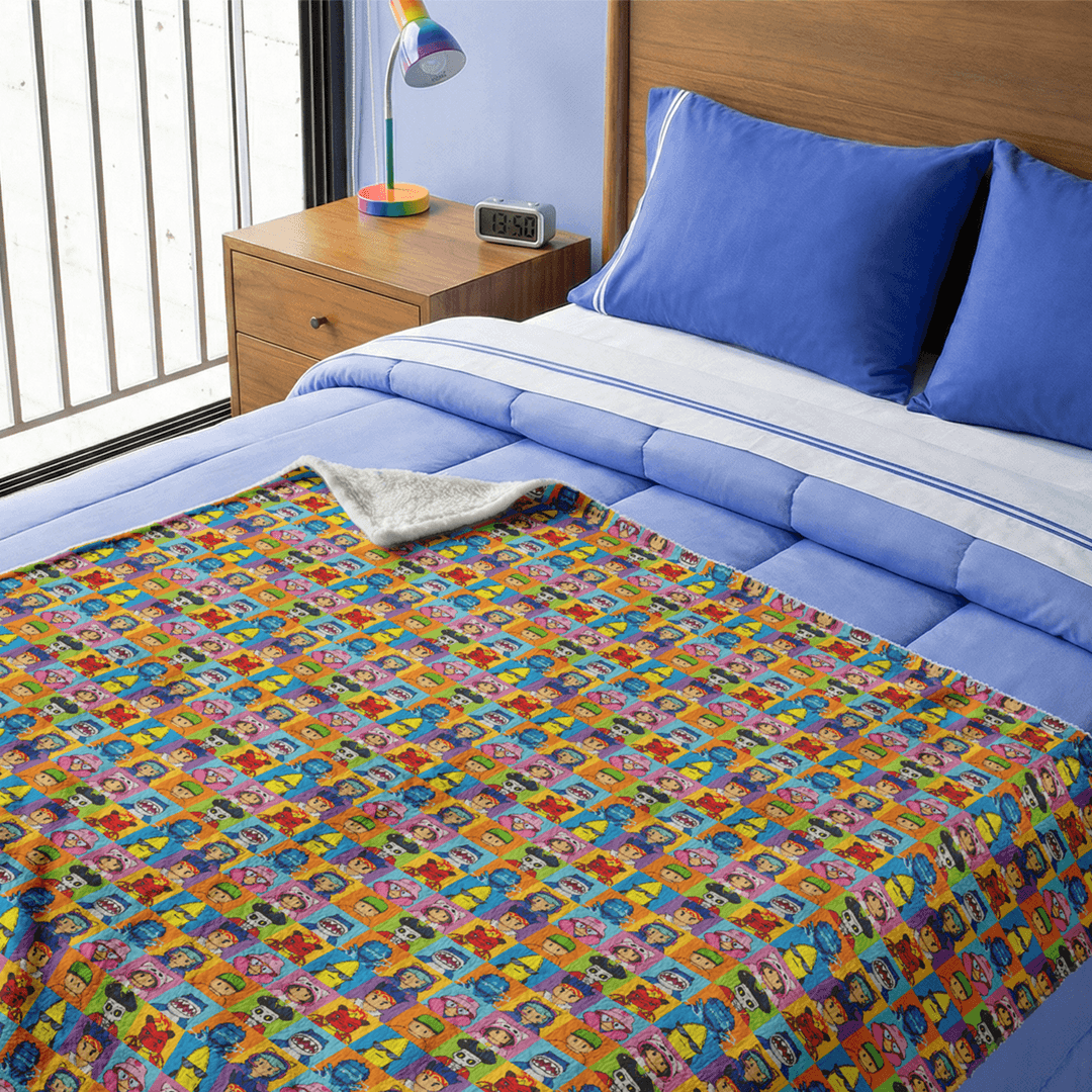 Stumble blanket on a bed