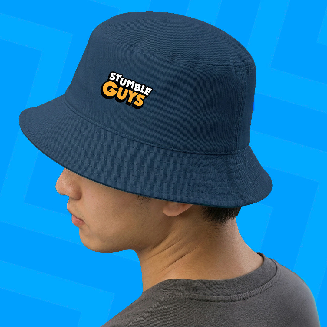 Person wearing a navy bucket hat with 'Stumble Guys' logo on a blue background