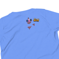 Load image into Gallery viewer, Light blue t-shirt with 'Stumble Guys' logo and character design on a white background
